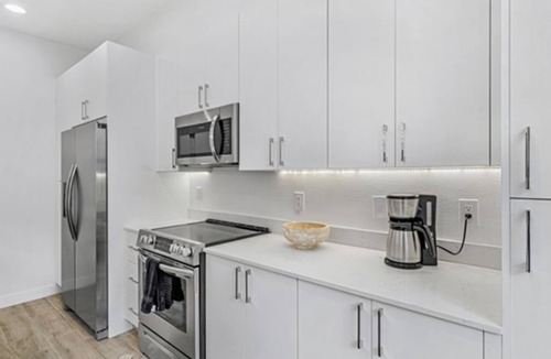 Pinecrest West Park House | Central Tampa Retreat, 2 Modern Townhomes + Patios