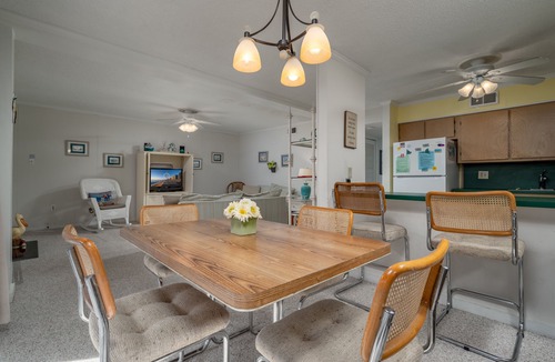 North Ocean City Condo | Charming 2 bed 2 bath condo featuring the ultimate private setting with wooded views that you can enjoy from your spacious deck.