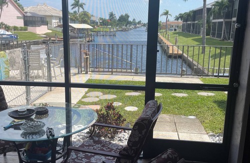 Pelican Condo | Charming 2-bedroom condo with pool just steps away WiFi, AC in lovely Cape Coral