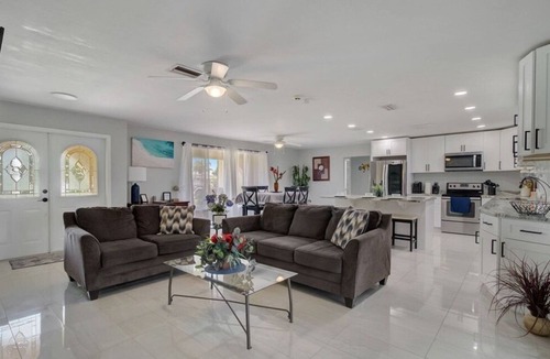 Yacht Club House | Charming 3 bed 2 bath. Heated pool. Canal front. Walk to the beach !