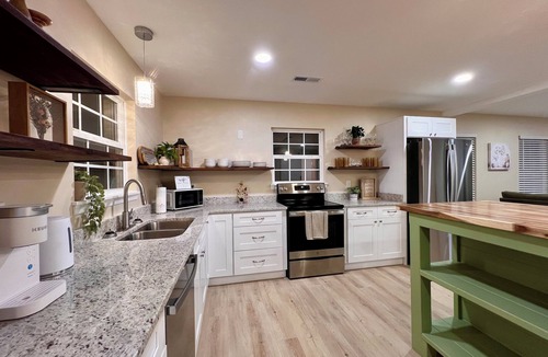 Higdon House | Charming 3 bedroom home with elegant speakeasy vibe. Fire pit. Billiards table.
