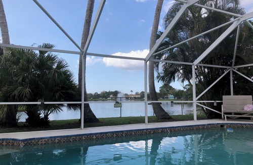 Jupiter Village House | Charming 3-bedroom pool home on the lake with spectacular sunsets & close to all