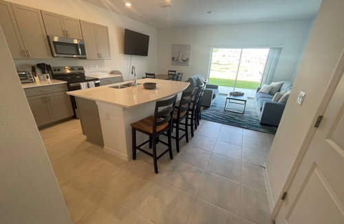 Nokomis House | Charming 3-bedroom townhome with easy access to beach, shops, and restaurants.