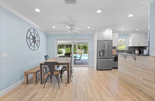 Jupiter House | Charming 4-Bedroom Beach Bungalow with Idyllic Pool & Backyard