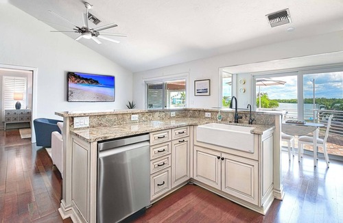 Isles of Capri House | Charming 4 bedroom, Pool, Dock, Bay View on Isles Of Capri, Naples Marco Island