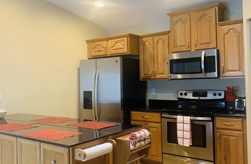 Spring Hill House | Charming Beach Getaway Villa with Large Private heated Pool