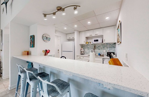 Villa Sabine Condo | Charming coastal condo with water views, great location, balcony, WiFi, A/C
