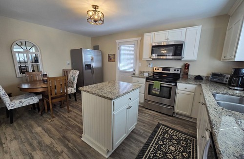 Mineral Bluff Cottage | Charming Mountain Retreat with fire pit, fenced yard, scenic views, and privacy.