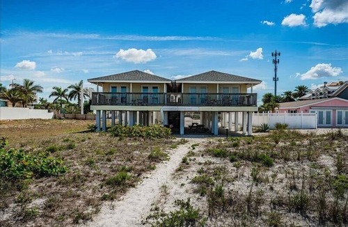 Indian Shores House | Charming Pet Friendly Beach Front Cottage with Unobstructed Million Dollar.