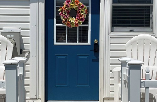 Long Neck Apartment | Charming two-bedroom, one bath, with screened porch is your perfect getaway.
