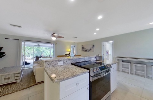 Fort Myers House | Charming waterfront home with firepit, central AC, W/D, & dog-friendly