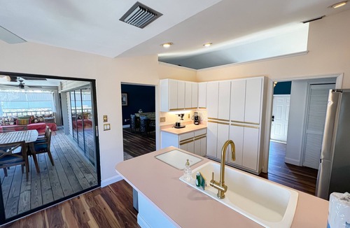Dinkins Bayou House | Charmingly colorful home with deck, beach gear, AC & W/D - dog-friendly
