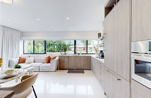North Corals House | Coastal Chic Escape: Modern Oasis in Oakland Park