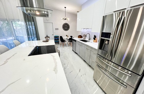 Dania Beach House | Coastal Chic Retreat:5 Min to Beach, Heated Pool, 4 BD , Near Casino & Parks!