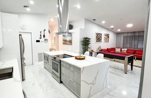 Dania Beach House | Coastal Chic Retreat:5 Min to Beach, Heated Pool, 4 BD , Near Casino & Parks!