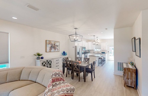 Holiday Beach House | Coastal-chic escape with bikes, enclosed backyard/shaded patio & Big Green Egg