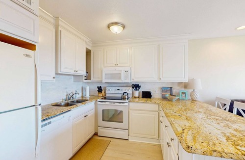 North Forest Beach Condo | Coastal Condo with Shared Pool Steps to the Beach, Walking Distance to Shopping and Dining
