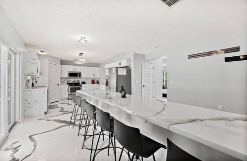 Palm Coast House | Coastal Retreat - Roomy, Relaxing, Pool