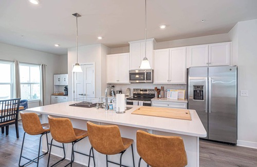 Bayside House | Coastal Townhome with 2 Pools & Gym