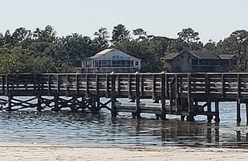 Crystal Beach Apartment | Coastline & relaxation steps away in Crystal Beach. Honeymoon Island 3miles away
