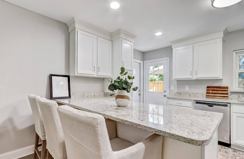 Dolphin's Cove Cottage | Cobia Cottage by the Sea - Brand New Putting Green and Peloton!