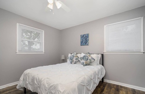 Rock Hill House | Comfortable ranch home with an art gallery vibe, updated kitchen and 55-inch smart TV.