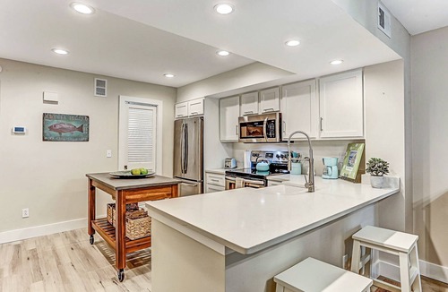 Amelia City House | Completely Remodeled Condo with Modern Kitchen & WiFi - Steps to Beach/Pool