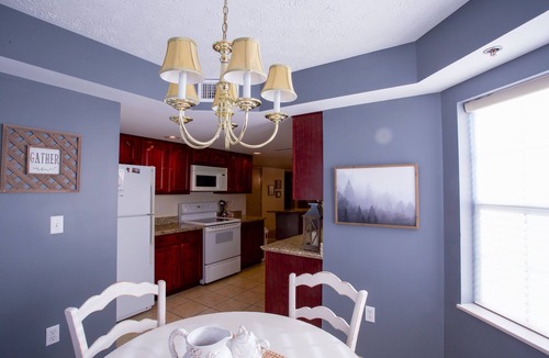 Gatlinburg Condo | Convenient Creekside condo with large wrap around balcony, close to everything!