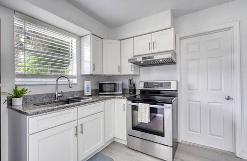 South Daytona House | Coquina Cabana with fenced yard and adorable decor