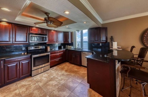Sand Key Condo | Corner condo overlooking the beach and bay. Secluded beach.