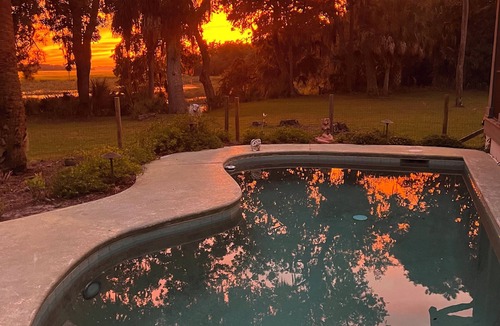 Saint Helena Island Cottage | Cozy 1 bedroom riverfront cottage on Saint Helena Island with pool & beach pass