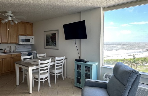 South Island Condo | Cozy Beach Condo w/heated pool. Amazing 24/7 views & newly renourished beach.