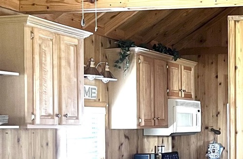 Dillard Cabin | Cozy Cabin in River Vista Mountain Village RV/Cabin Park + Amenities