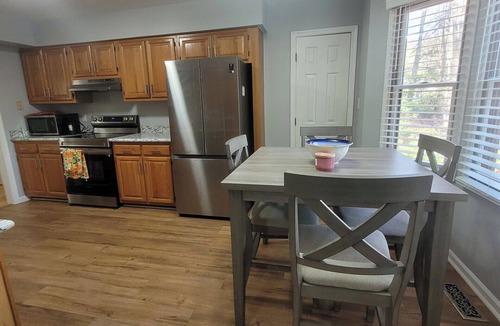 Ocean Pines House | Cozy home featuring a screened-in porch and access to a refreshing pool. Your oasis awaits!