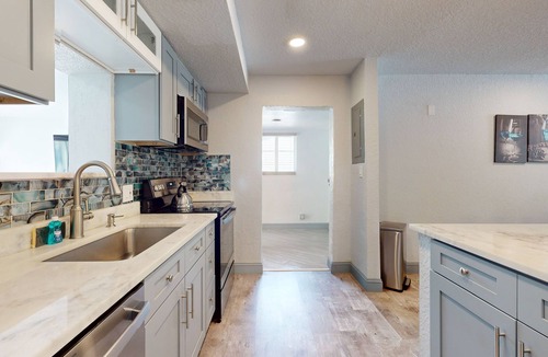 Riviera Beach House | Cozy home with B.B.Q.grill, hot tub, central AC, and enclosed yard