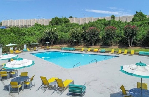 Loring Heights Apartment | Cozy King Bed w/ comfortable sleeper sofa and “Free Parking” awaits you!