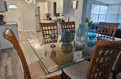 Riviera Beach House | Cozy Near The Beach is < 2 mi from the beach. Six beds. Sleeps 8 comfortably.