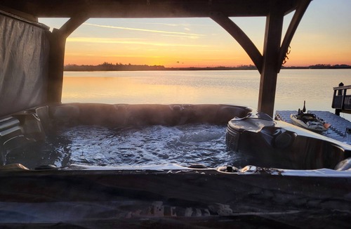 Crystal River House | Cozy Riverfront Retreat in Ozello with hot tub, private dock and amazing views