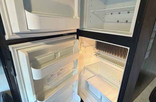 Courier City - Oscawana House | Cozy RV in Tampa, Hyde Park area with WiFi, AC. Close to UT, downtown.
