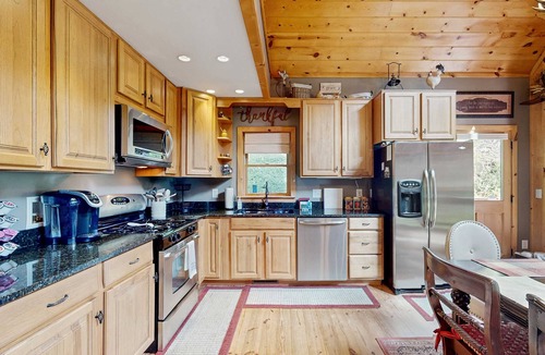 Sky Valley House | Cozy waterfront home w/hot tub, swing, firepit, and fireplace