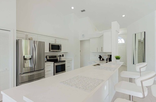 Crown Pointe House | Crown Pointe- Covered Lanai w/TV-Heated South Facing Pool, Newly Renovated home w/3 king beds!
