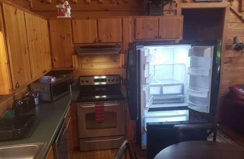 Arley Cabin | Cute, cozy log cabin on beautiful Smith Lake, Arley AL (year round deep water)