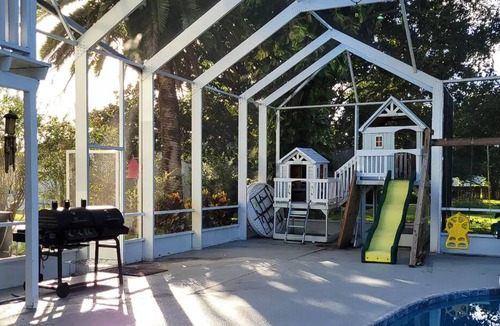 Daytona Beach House | Daytona Beach pool, playset, GAME ROOM hot tub, 5 bedroom home