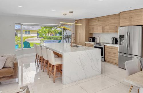 Dolphin Isles Villa | Designer Beach House with Heated Pool, Walk to Sand
