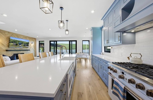 Hewitt House | Designer Lakefront | Kayaks Dock Firepit