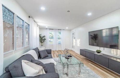 Crescent Lake Apartment | Designer Sun Filled Condo - Walk to Town