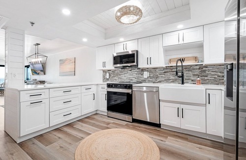 New Smyrna Beach Condo | Direct oceanfront condo with a large balcony, heated pool, and beach access