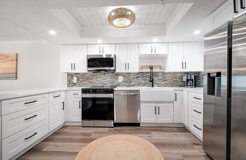 New Smyrna Beach Condo | Direct oceanfront condo with a large balcony, heated pool, and beach access