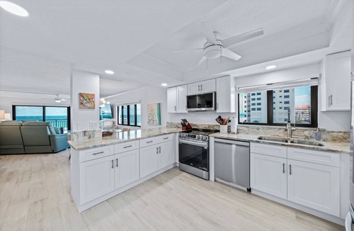 New Smyrna Beach Condo | Direct oceanfront southern corner condo with large wrap-around balcony and heated pool