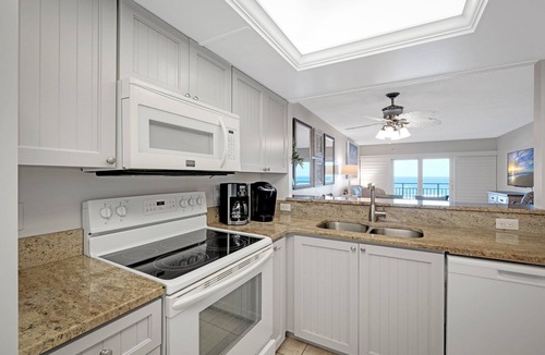 New Smyrna Beach Condo | Direct oceanfront condo with private balcony, heated beachfront pool, and beach access